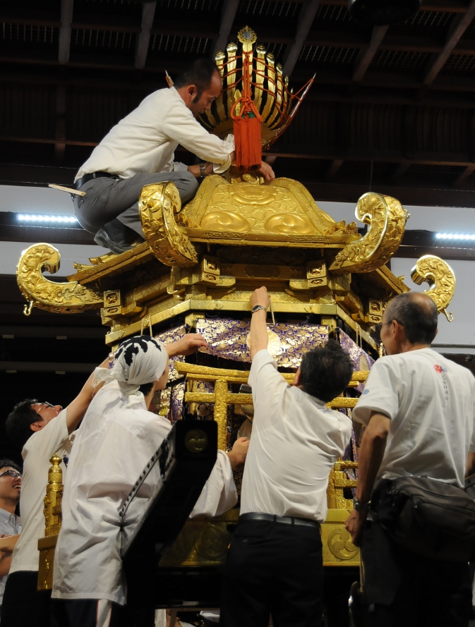 dressing the mikoshi in gold again