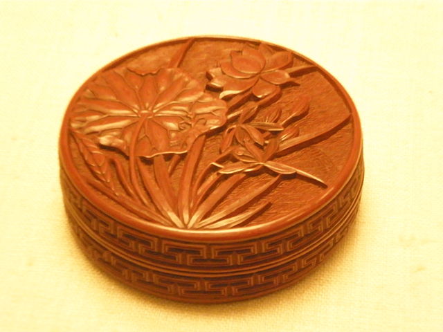 carved lacquer on round box