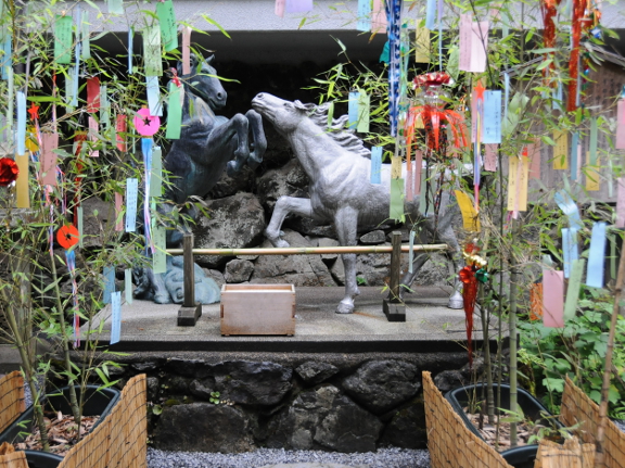 Statues of white and black horses at Kifune Shrine