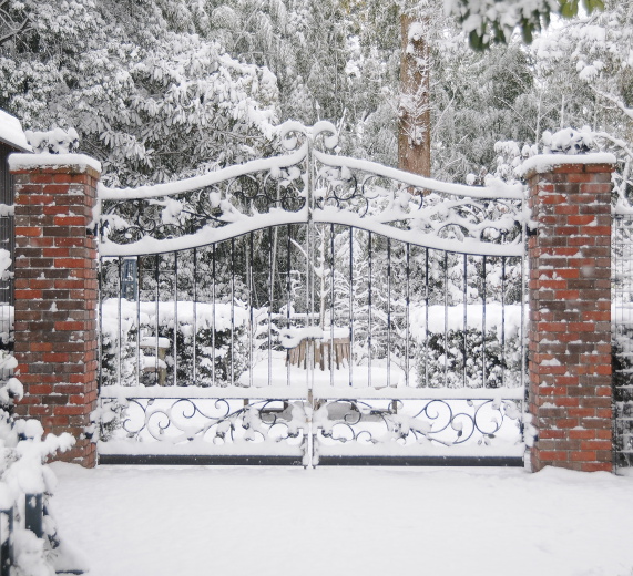Snowy path with gate