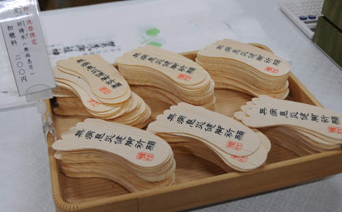 Prayer cards in the form of feet
