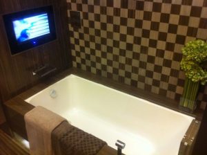 Bathtub with TV in front